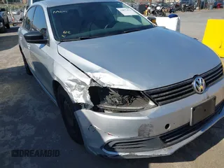 2014 Volkswagen Jetta S with VIN 3VW2K7AJ0EM391770, listed as a IAAI auction lot 42677433 with 200,032 mi miles and . Bid and sale history available at DreamBid. Image 6.