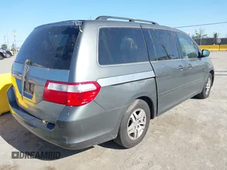 2007 Honda Odyssey EX-L z VIN 5FNRL38647B443269, wystawiony jako IAAI lot #42316300 z przebiegiem 121 616 mil mil oraz . Historia ofert i sprzedaży dostępna na DreamBid. Obrazek 4.