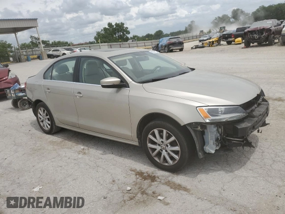 2014 Volkswagen Jetta SE with VIN 3VWD07AJ6EM209228, listed as a Copart auction lot 60500525 with 118,261 mi miles and Salvage title. Bid and sale history available at DreamBid. Image 4.