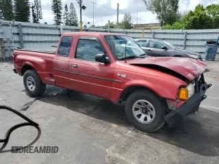 2002 Ford Ranger XL with VIN 1FTYR14V32TA65124, listed as a Copart auction lot 65009025 with 134,746 mi miles and Salvage title. Bid and sale history available at DreamBid. Image 4.
