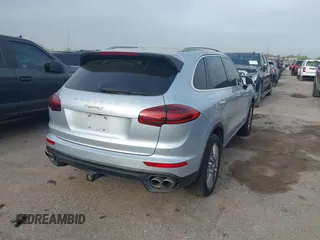 2016 Porsche Cayenne S E-Hybrid with VIN WP1AE2A26GLA59496, listed as a IAAI auction lot 41884022 with 85,386 mi miles and . Bid and sale history available at DreamBid. Image 4.
