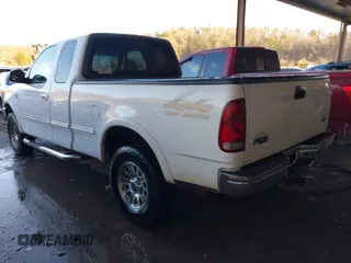 1998 Ford F-150 with VIN 1FTZX18W5WNB68293, listed as a IAAI auction lot 41403989 with 217,473 mi miles and . Bid and sale history available at DreamBid. Image 3.