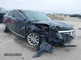 2013 Cadillac XTS Luxury with VIN 2G61P5S34D9134111, listed as a IAAI auction lot 41623629 with 52,182 mi miles. Bid and sale history available at carsss.com. Image 1.