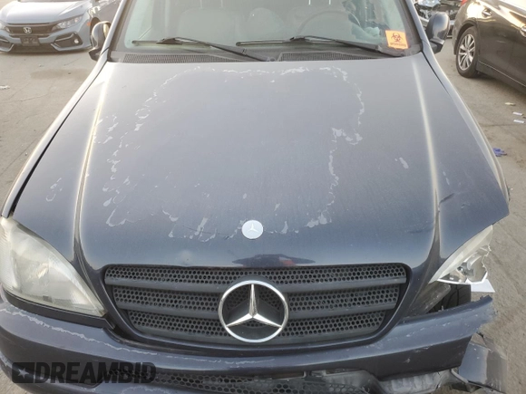2001 Mercedes-Benz M 320/430/500 z VIN 4JGAB72E91A260677, wystawiony jako Copart lot #89200235 z przebiegiem 180 414 mil mil oraz Szkoda całkowita • Salvage title. Historia ofert i sprzedaży dostępna na DreamBid. Obrazek 11.