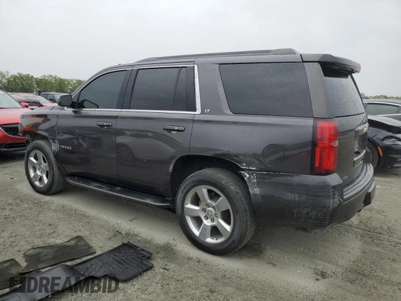 2015 Chevrolet Tahoe LT with VIN 1GNSCBKC9FR118286, listed as a Copart auction lot 56168375 with 144,824 mi miles and Salvage title. Bid and sale history available at DreamBid. Image 2.