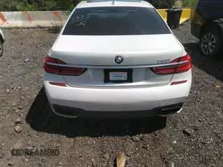 2017 BMW 7 Series 750i with VIN WBA7F0C35HGM21649, listed as a IAAI auction lot 37362691 with 10,000 mi miles and . Bid and sale history available at DreamBid. Image 16.
