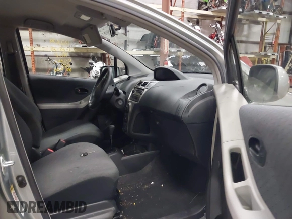 2009 Toyota Yaris with VIN JTDKT903695262863, listed as a IAAI auction lot 41456767 with 206,534 mi miles and . Bid and sale history available at DreamBid. Image 5.