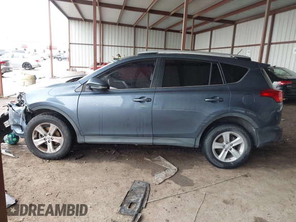 2013 Toyota RAV4 XLE with VIN JTMRFREV0DD032525, listed as a IAAI auction lot 42155458 with 162,482 mi miles and . Bid and sale history available at DreamBid. Image 14.