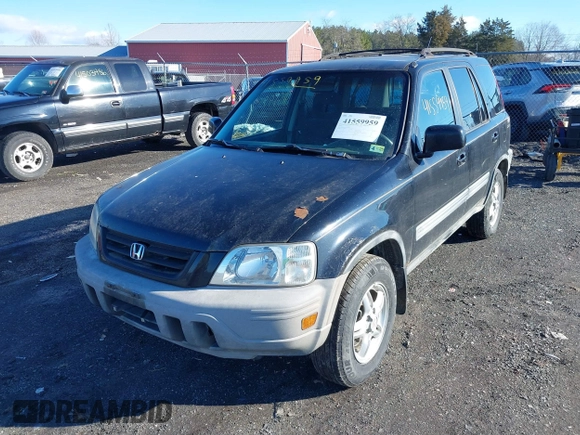 2000 Honda CR-V EX with VIN JHLRD1863YC022811, listed as a IAAI auction lot 41559959 with 211,925 mi miles. Bid and sale history available at carsss.com. Image 6.