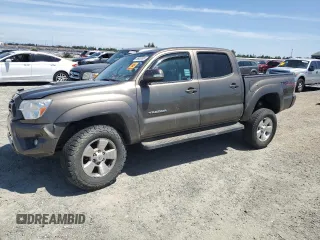 2015 Toyota Tacoma z VIN 3TMLU4EN7FM188941, wystawiony jako Copart lot #56965585 z przebiegiem 124 192 mil mil oraz Szkoda całkowita • Salvage title. Historia ofert i sprzedaży dostępna na DreamBid. Obrazek 1.