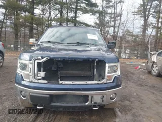 2014 Ford F-150 XL with VIN 1FTFW1EFXEFC89999, listed as a IAAI auction lot 41491284 with 98,569 mi miles. Bid and sale history available at carsss.com. Image 12.