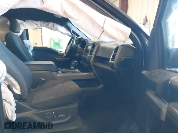 2015 Ford F-150 XLT with VIN 1FTFW1EF3FKD51350, listed as a IAAI auction lot 41413942 with 125,877 mi miles and . Bid and sale history available at carsss.com. Image 5.
