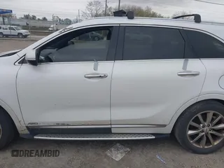 2016 Kia Sorento SX z VIN 5XYPKDA59GG113511, wystawiony jako IAAI lot #41997346 z przebiegiem 140 017 mil mil oraz . Historia ofert i sprzedaży dostępna na DreamBid. Obrazek 15.