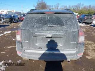 2017 Jeep Compass Latitude with VIN 1C4NJDEB5HD165566, listed as a IAAI auction lot 41290480 with 107,267 mi miles and . Bid and sale history available at DreamBid. Image 16.