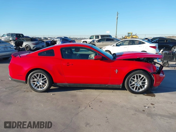 2012 Ford Mustang V6 Premium with VIN 1ZVBP8AM5C5262332, listed as a IAAI auction lot 41243050 with 105,157 mi miles. Bid and sale history available at carsss.com. Image 13.