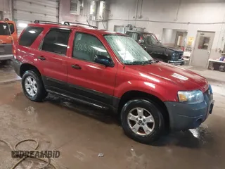 2005 Ford Escape XLT with VIN 1FMYU03115KA75972, listed as a IAAI auction lot 42058791 with 205,005 mi miles and . Bid and sale history available at DreamBid. Image 1.