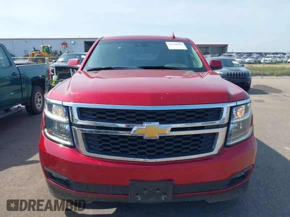 2015 Chevrolet Suburban LT with VIN 1GNSKJKC5FR726299, listed as a IAAI auction lot 42740904 with 96,700 mi miles and . Bid and sale history available at DreamBid. Image 12.