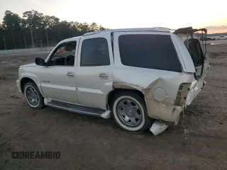 2003 Cadillac Escalade z VIN 1GYEC63T63R139405, wystawiony jako Copart lot #88884095 z przebiegiem Nie podano mil oraz Szkoda całkowita • Salvage title. Historia ofert i sprzedaży dostępna na DreamBid. Obrazek 2.