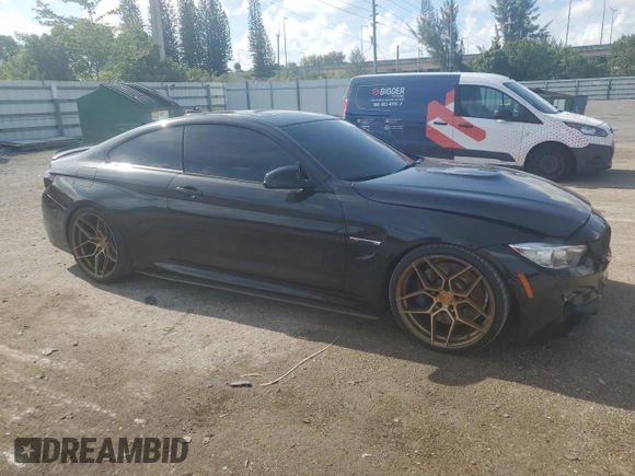 2015 BMW M4 with VIN WBS3R9C57FK332862, listed as a Copart auction lot 59395104 with 63,112 mi miles and Salvage Title. Bid and sale history available at carsss.com. Image 4.