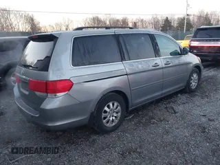 2009 Honda Odyssey EX-L with VIN 5FNRL387X9B005030, listed as a IAAI auction lot 41775144 with 155,531 mi miles. Bid and sale history available at carsss.com. Image 4.