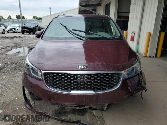 2017 Kia Sedona SX-L with VIN KNDME5C14H6279899, listed as a Copart auction lot 60642874 with 102,658 mi miles and Salvage Title. Bid and sale history available at carsss.com. Image 5.