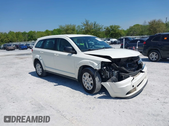 2015 Dodge Journey SE z VIN 3C4PDCAB7FT572716, wystawiony jako IAAI lot #42010091 z przebiegiem 186 489 mil mil oraz . Historia ofert i sprzedaży dostępna na DreamBid. Obrazek 1.