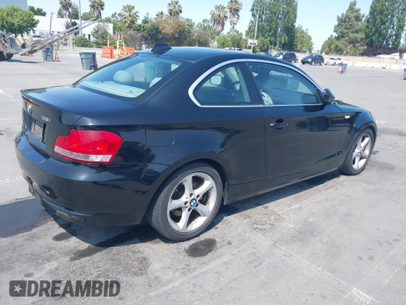 2011 BMW 1 Series 128i with VIN WBAUP9C51BVL90277, listed as a IAAI auction lot 42572690 with 153,427 mi miles and . Bid and sale history available at DreamBid. Image 4.