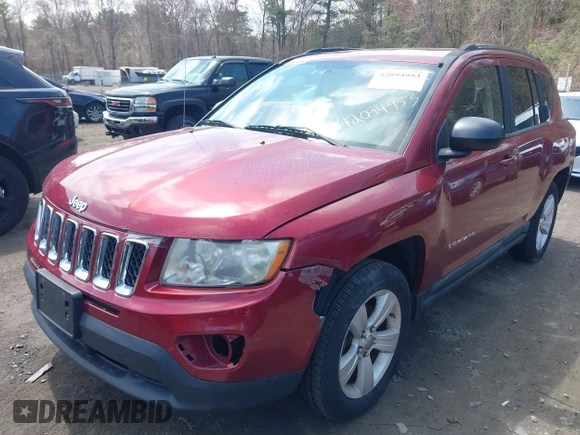 2011 Jeep Compass Latitude with VIN 1J4NT1FB8BD170401, listed as a IAAI auction lot 42094953 with 122,617 mi miles. Bid and sale history available at carsss.com. Image 2.