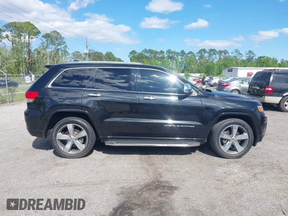 2014 Jeep Grand Cherokee Overland with VIN 1C4RJECG8EC417995, listed as a IAAI auction lot 41959550 with 155,029 mi miles. Bid and sale history available at carsss.com. Image 13.