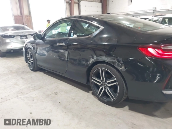 2016 Honda Accord Touring with VIN 1HGCT2B05GA002832, listed as a IAAI auction lot 42221520 with 217,435 mi miles and . Bid and sale history available at DreamBid. Image 18.