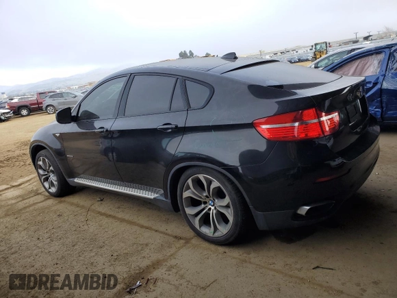 2011 BMW X6 50i with VIN 5UXFG8C56BLZ96125, listed as a Copart auction lot 84271244 with 69,732 mi miles and Salvage Title. Bid and sale history available at carsss.com. Image 2.