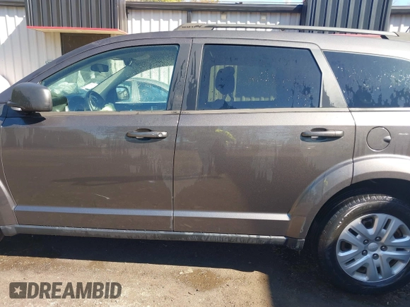 2016 Dodge Journey SE with VIN 3C4PDCAB6GT104588, listed as a IAAI auction lot 41823732 with 133,819 mi miles. Bid and sale history available at carsss.com. Image 14.