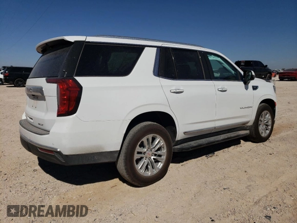 2024 GMC Yukon SLT with VIN 1GKS2BKD6RR237359, listed as a Copart auction lot 77892564 with 9,880 mi miles and Salvage Title. Bid and sale history available at carsss.com. Image 3.