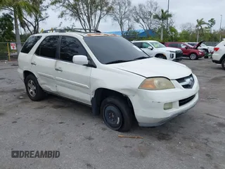 2004 Acura MDX Touring Pkg w/Navigation with VIN 2HNYD18834H557908, listed as a IAAI auction lot 41259386 with 213,983 mi miles. Bid and sale history available at carsss.com. Image 1.