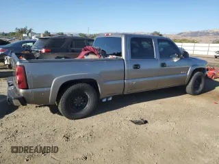 2007 GMC Sierra 1500HD SLE z VIN 1GTGC13U07F102660, wystawiony jako Copart lot #74766114 z przebiegiem Nie podano mil oraz Szkody całkowita. Historia ofert i sprzedaży dostępna na DreamBid. Obrazek 3.