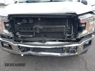 2018 Ford F-150 XL with VIN 1FTEW1CB4JKC87131, listed as a IAAI auction lot 42120579 with 93,143 mi miles. Bid and sale history available at carsss.com. Image 6.