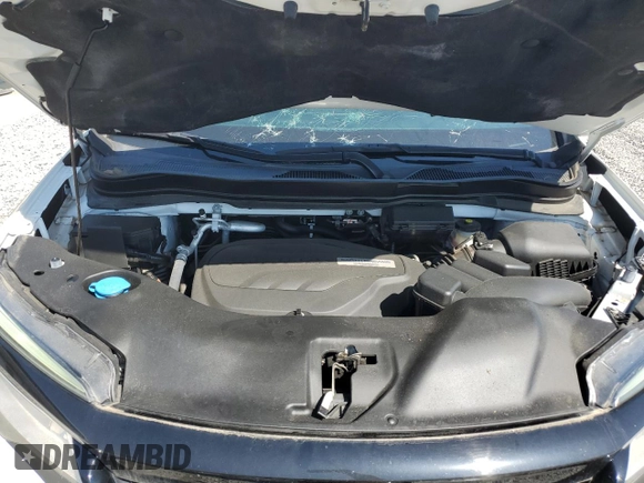 2019 Honda Passport Touring z VIN 5FNYF8H95KB023801, wystawiony jako Copart lot #51888605 z przebiegiem 77 060 mil mil oraz Szkoda całkowita • Salvage title. Historia ofert i sprzedaży dostępna na DreamBid. Obrazek 12.