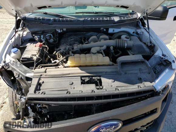 2020 Ford F-150 XL with VIN 1FTMF1CB7LKE33505, listed as a Copart auction lot 48828665 with 100,996 mi miles and Salvage Title. Bid and sale history available at carsss.com. Image 11.