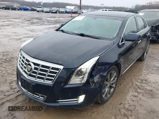 2013 Cadillac XTS Luxury with VIN 2G61P5S3XD9196239, listed as a IAAI auction lot 41205081 with 161,885 mi miles and . Bid and sale history available at carsss.com. Image 6.