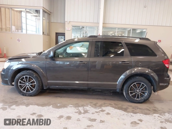 2018 Dodge Journey SE with VIN 3C4PDCAB9JT428917, listed as a IAAI auction lot 41578750 with 136,886 mi miles and . Bid and sale history available at DreamBid. Image 14.