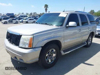 2005 Cadillac Escalade z VIN 1GYEC63N65R249827, wystawiony jako IAAI lot #42247650 z przebiegiem 254 052 mil mil oraz . Historia ofert i sprzedaży dostępna na DreamBid. Obrazek 2.