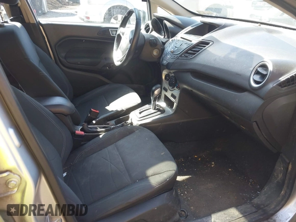 2016 Ford Fiesta SE with VIN 3FADP4BJ4GM106538, listed as a IAAI auction lot 41871345 with 123,847 mi miles. Bid and sale history available at carsss.com. Image 5.