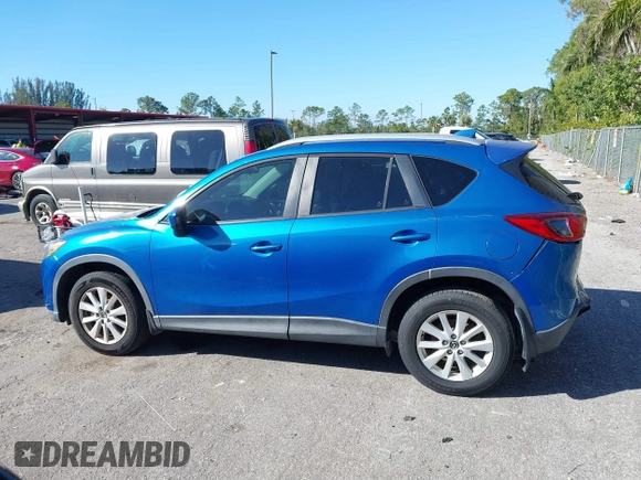 2014 Mazda CX-5 Touring with VIN JM3KE2CYXE0310873, listed as a IAAI auction lot 41309633 with 175,325 mi miles and . Bid and sale history available at DreamBid. Image 15.