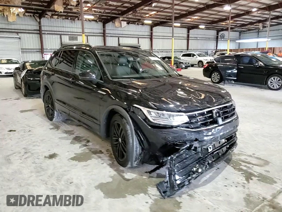 2022 Volkswagen Tiguan SE R-Line Black with VIN 3VVCB7AX1NM140818, listed as a Copart auction lot 71376004 with 29,190 mi miles and Salvage title. Bid and sale history available at DreamBid. Image 14.
