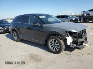 2018 Mazda CX-9 Touring с VIN JM3TCACYXJ0218807, выставлен на аукционе Copart как лот 37327273 с пробегом 85 471 миль миль и Списание • Salvage title. История ставок и продаж доступна на DreamBid. Изображение 4.