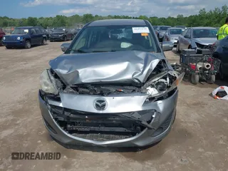 2014 Mazda 5 Sport with VIN JM1CW2BL6E0164195, listed as a IAAI auction lot 42455158 with 155,007 mi miles and . Bid and sale history available at DreamBid. Image 13.