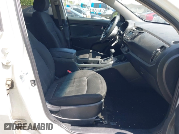 2013 Kia Sportage LX with VIN KNDPB3A23D7514304, listed as a IAAI auction lot 42544397 with 82,456 mi miles and . Bid and sale history available at DreamBid. Image 5.