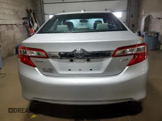 2014 Toyota Camry SE with VIN 4T1BK1FK0EU024666, listed as a Copart auction lot 52403395 with 129,728 mi miles and Salvage Title. Bid and sale history available at carsss.com. Image 6.