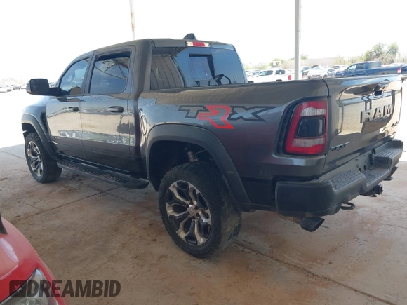 2022 Ram 1500 TRX with VIN 1C6SRFU97NN353587, listed as a IAAI auction lot 42174702 with 35,305 mi miles and . Bid and sale history available at DreamBid. Image 3.