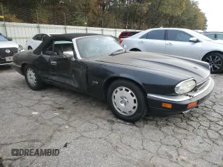 1996 Jaguar XJS with VIN SAJNX2740TC225643, listed as a Copart auction lot 80975784 with 98,427 mi miles and Salvage Title. Bid and sale history available at carsss.com. Image 4.